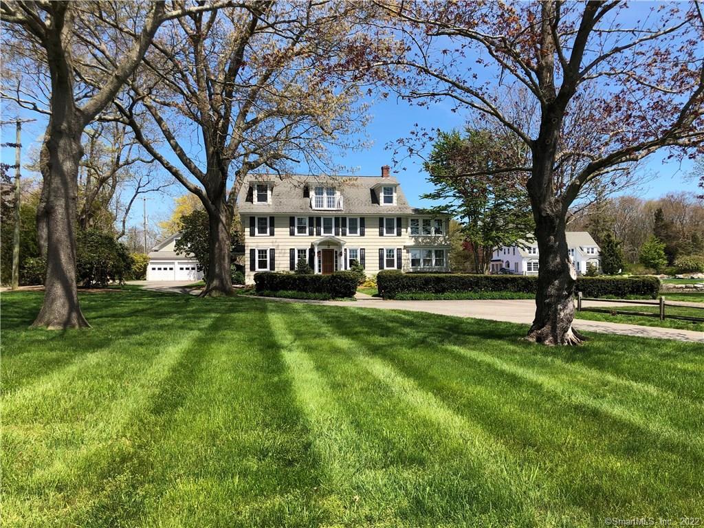 40 Middle Beach Road West Madison, CT 06443 - Photo 1 of 1 a view of a house with a big yard and large trees
