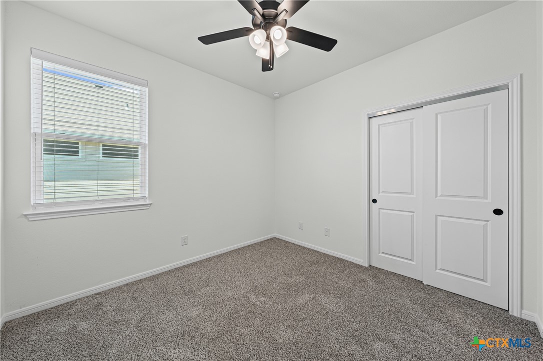 7810 Timber Holw Lane Temple, TX 76502 - Photo 18 of 32 a view of an empty room with a window