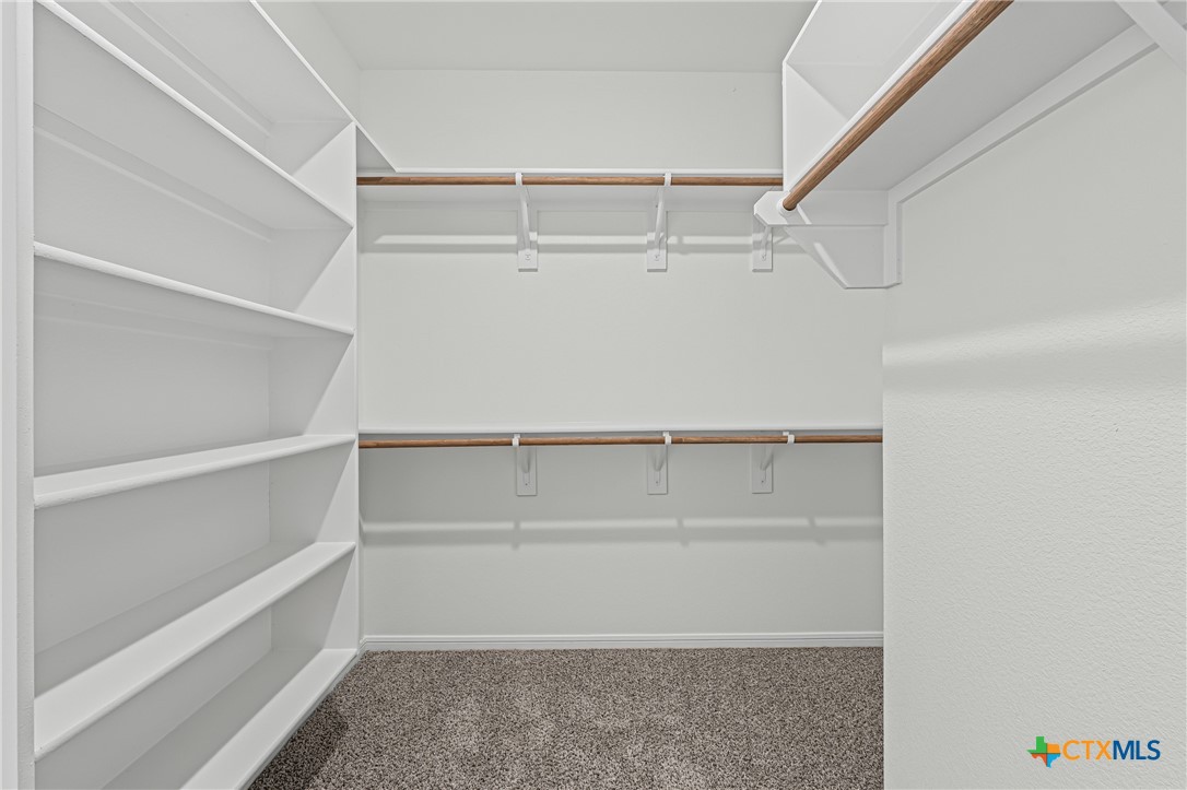 7810 Timber Holw Lane Temple, TX 76502 - Photo 29 of 32 a view of an empty walk in closet