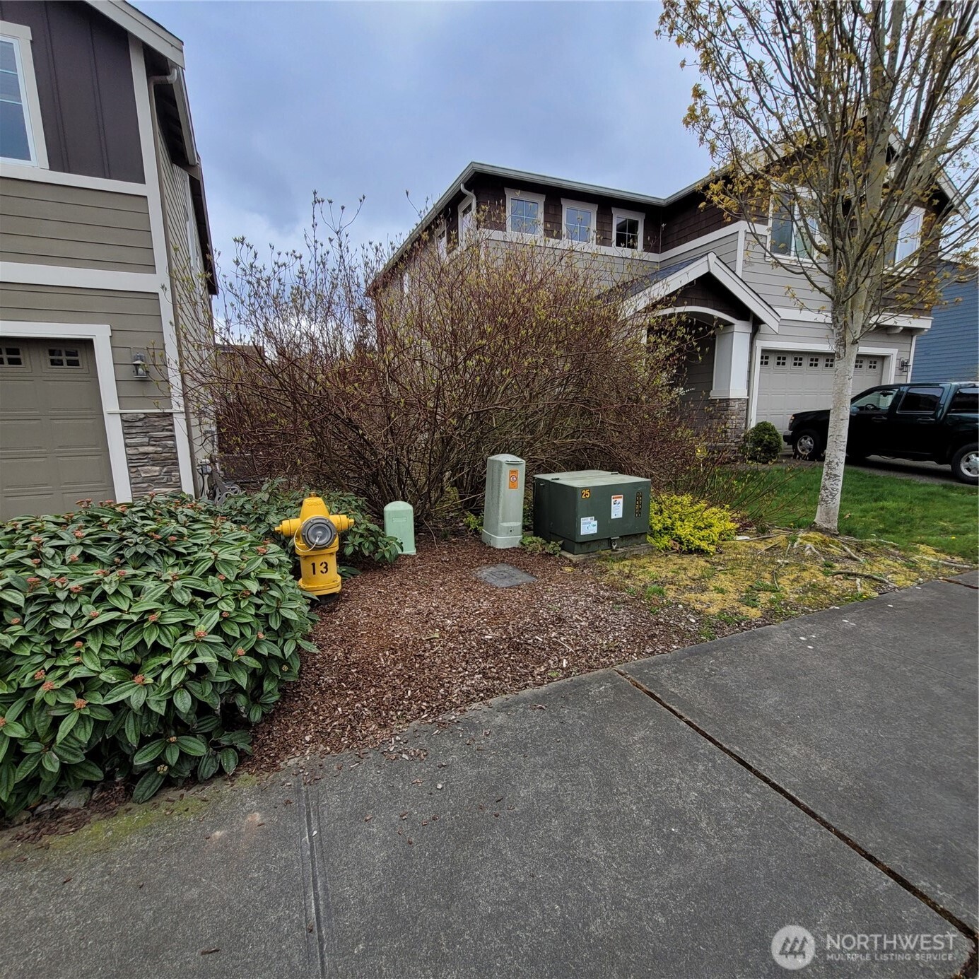 601 Jericho Avenue Northeast Renton, WA 98059 - Photo 8 of 9 a front view of a house with garden
