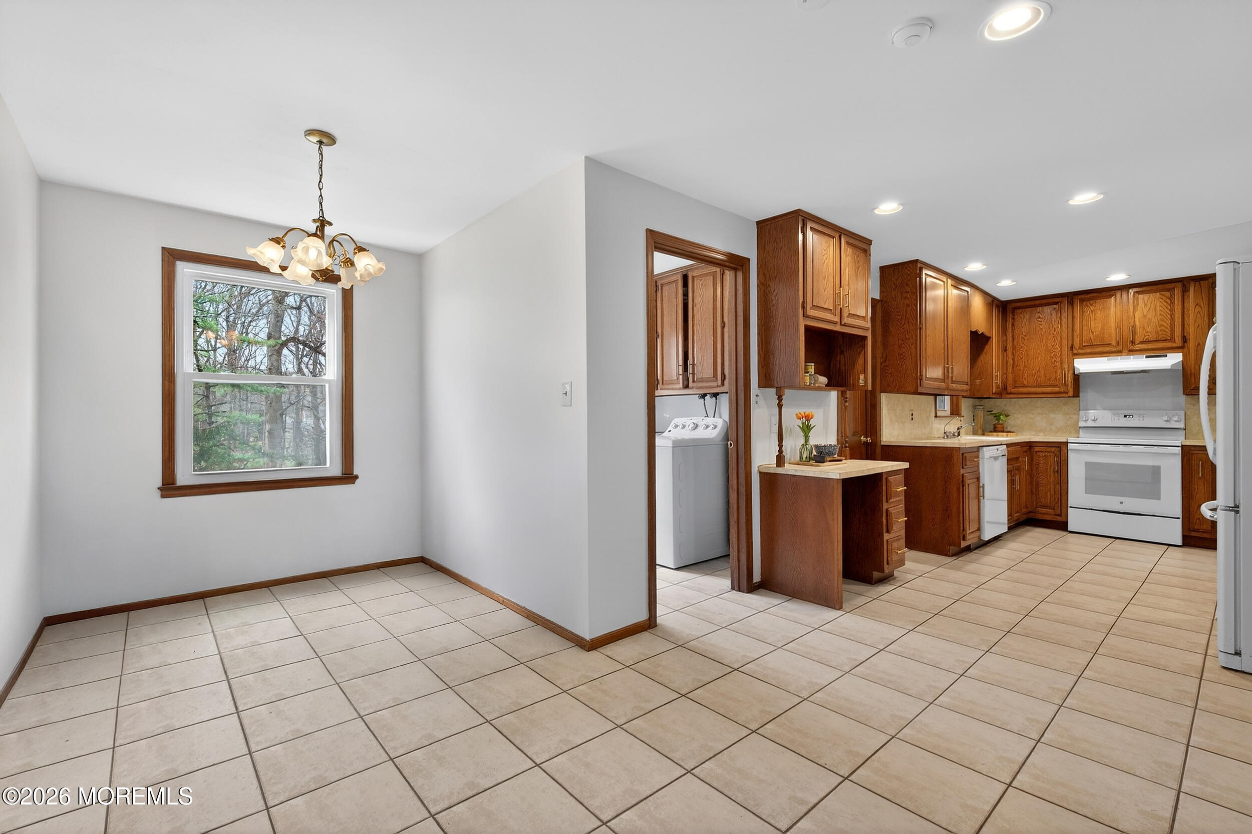 76 Telegraph Hill Road Holmdel, NJ 07733 - Photo 13 of 51 a kitchen with stainless steel appliances granite countertop a refrigerator and a sink