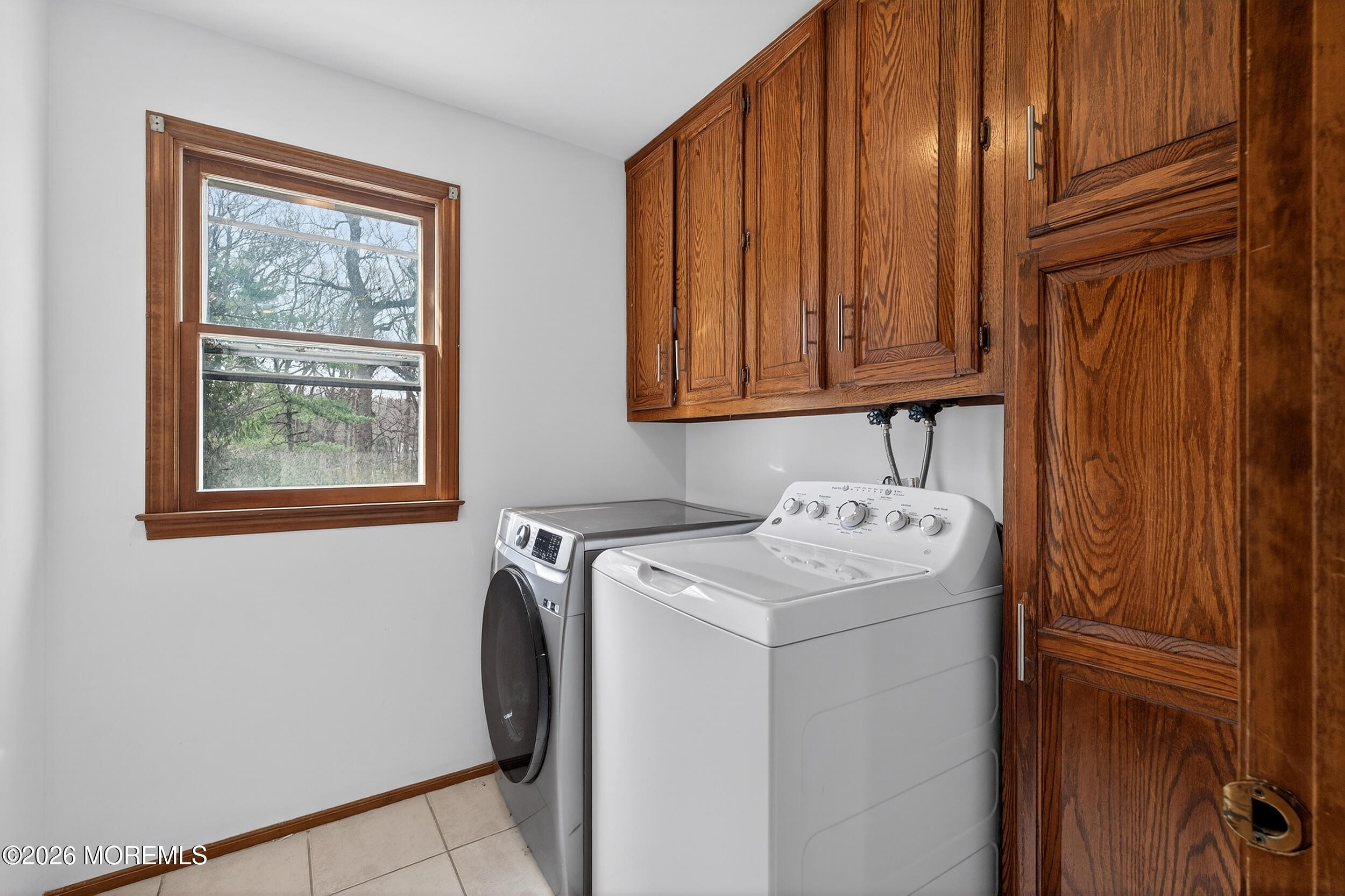 76 Telegraph Hill Road Holmdel, NJ 07733 - Photo 15 of 51 a utility room with dryer and washer