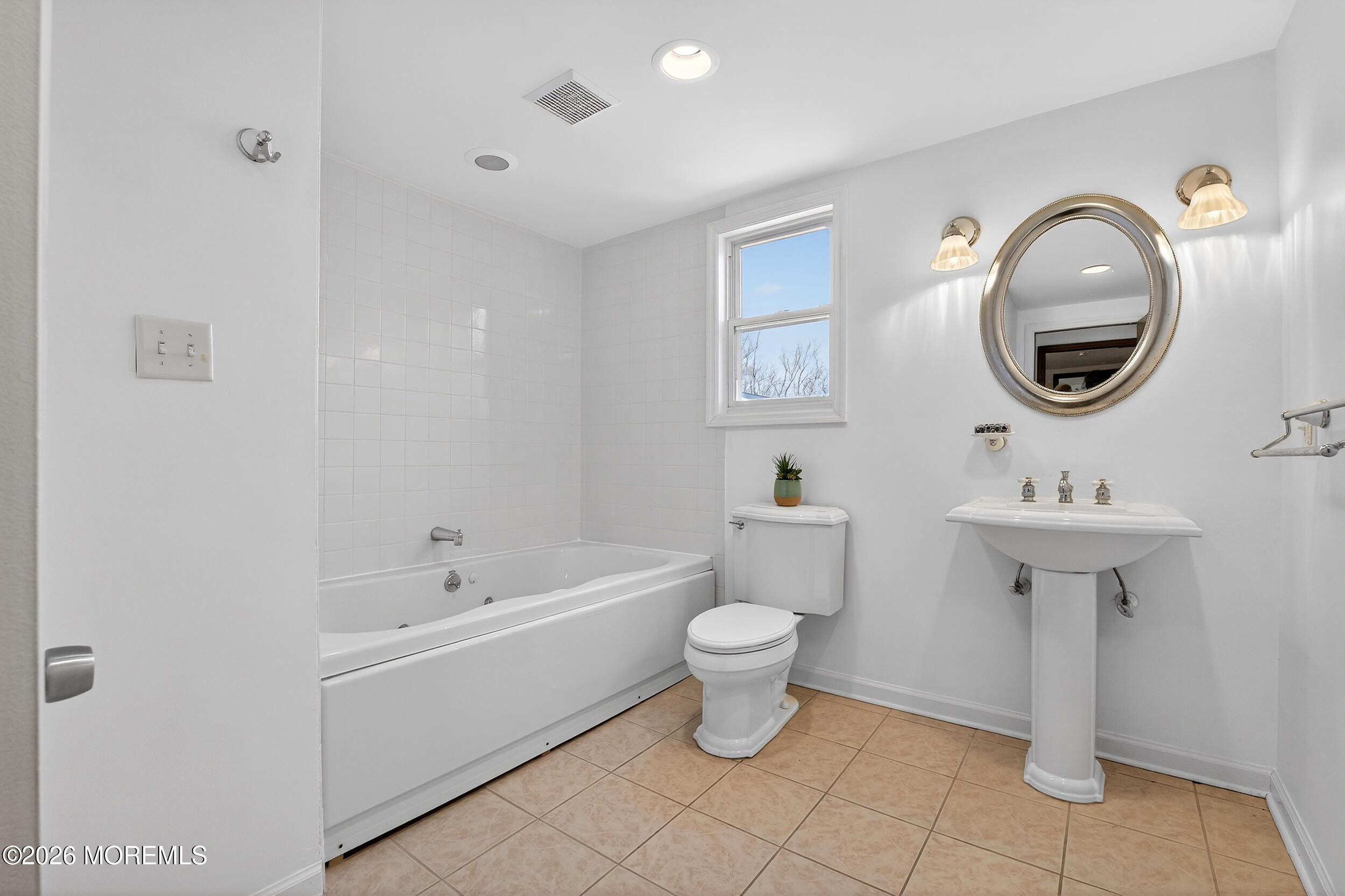 76 Telegraph Hill Road Holmdel, NJ 07733 - Photo 24 of 51 a bathroom with a sink toilet and a mirror