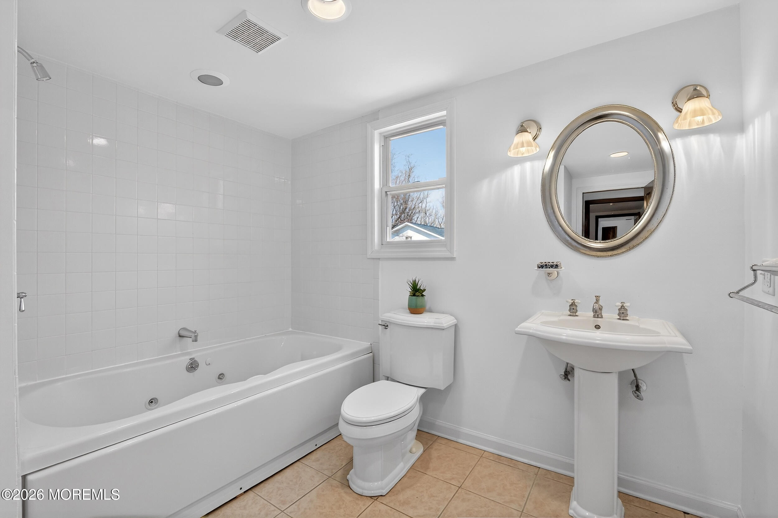 76 Telegraph Hill Road Holmdel, NJ 07733 - Photo 25 of 51 a bathroom with a toilet a sink and mirror