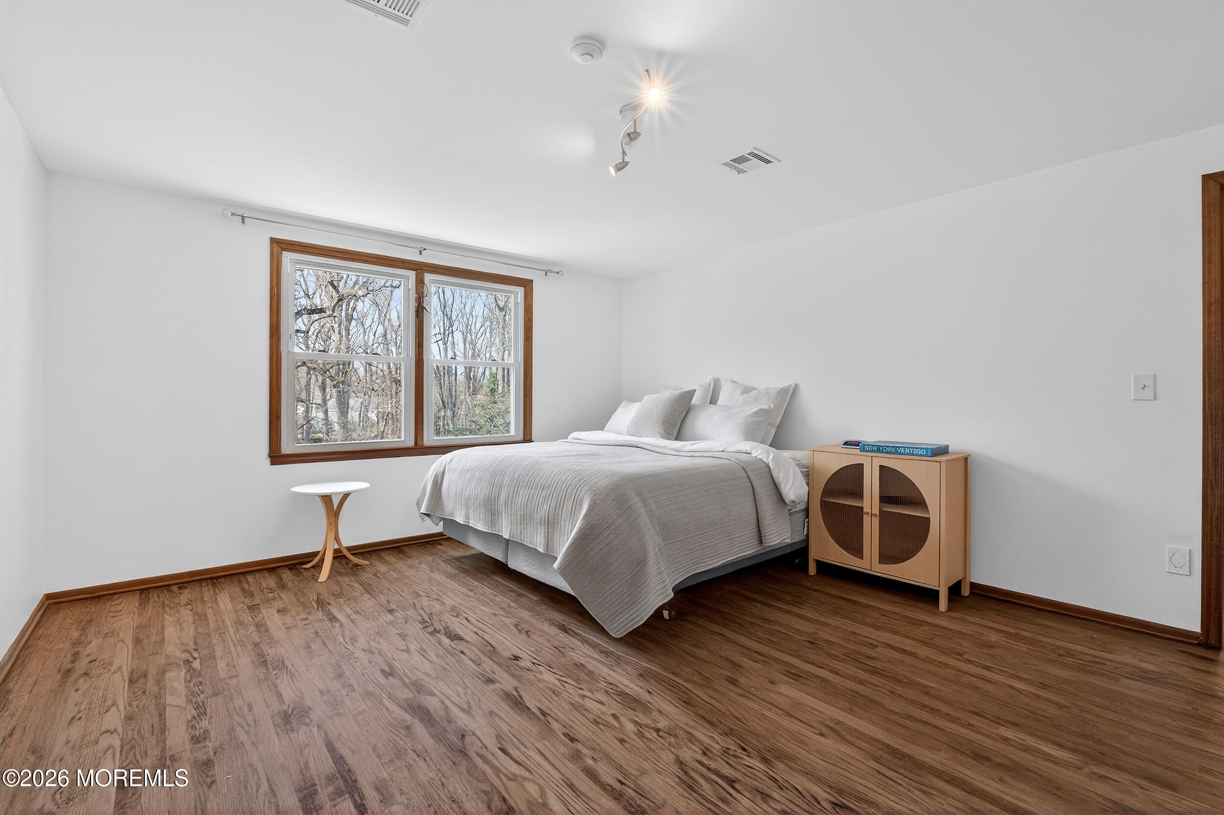 76 Telegraph Hill Road Holmdel, NJ 07733 - Photo 28 of 51 a bedroom with a bed and a window