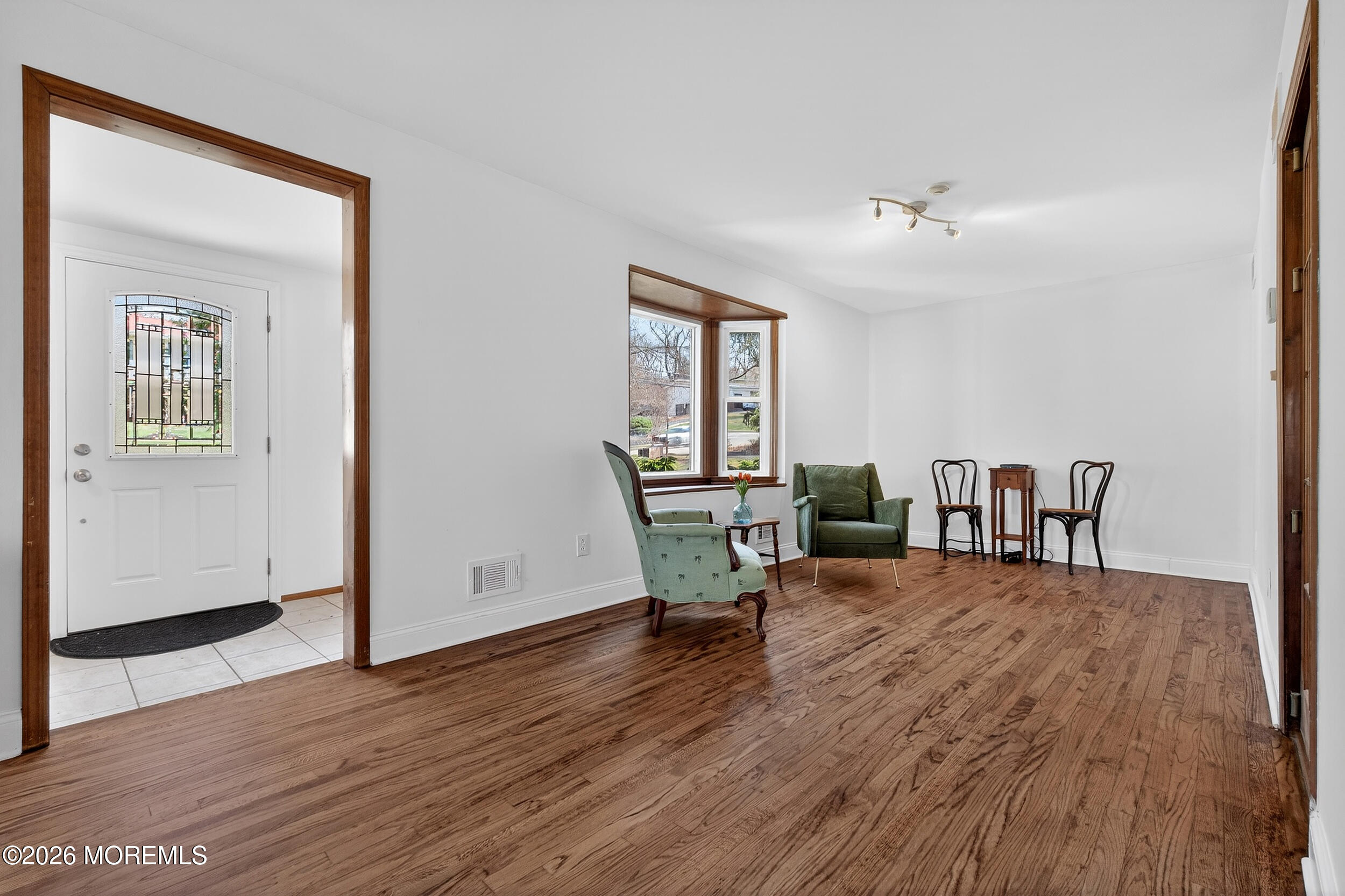 76 Telegraph Hill Road Holmdel, NJ 07733 - Photo 4 of 51 a view of a livingroom with furniture and wooden floor