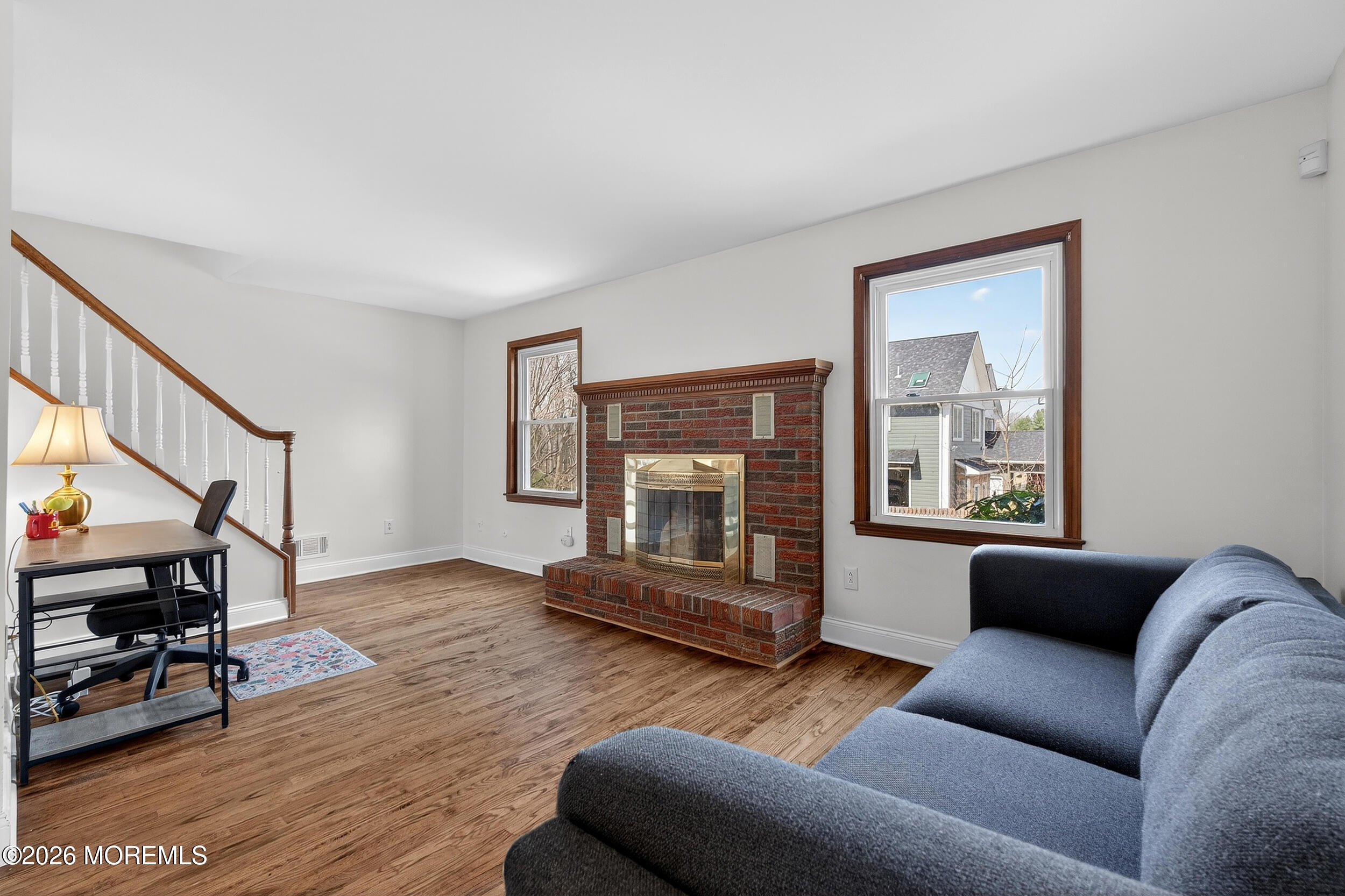 76 Telegraph Hill Road Holmdel, NJ 07733 - Photo 6 of 51 a living room with furniture and a fireplace