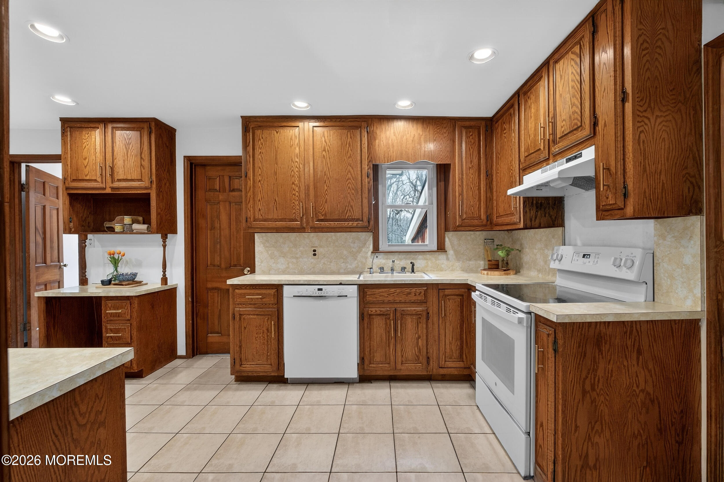 76 Telegraph Hill Road Holmdel, NJ 07733 - Photo 7 of 51 a kitchen with a sink cabinets and window