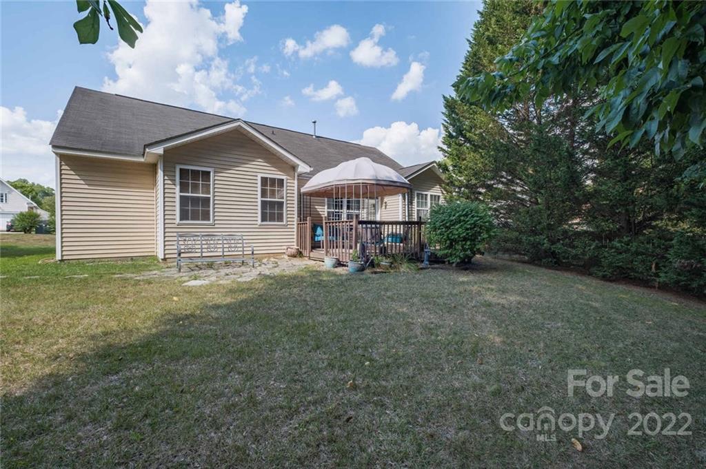 8010 Trotter Road Charlotte, NC 28216 - Photo 29 of 42 a view of a house with a yard