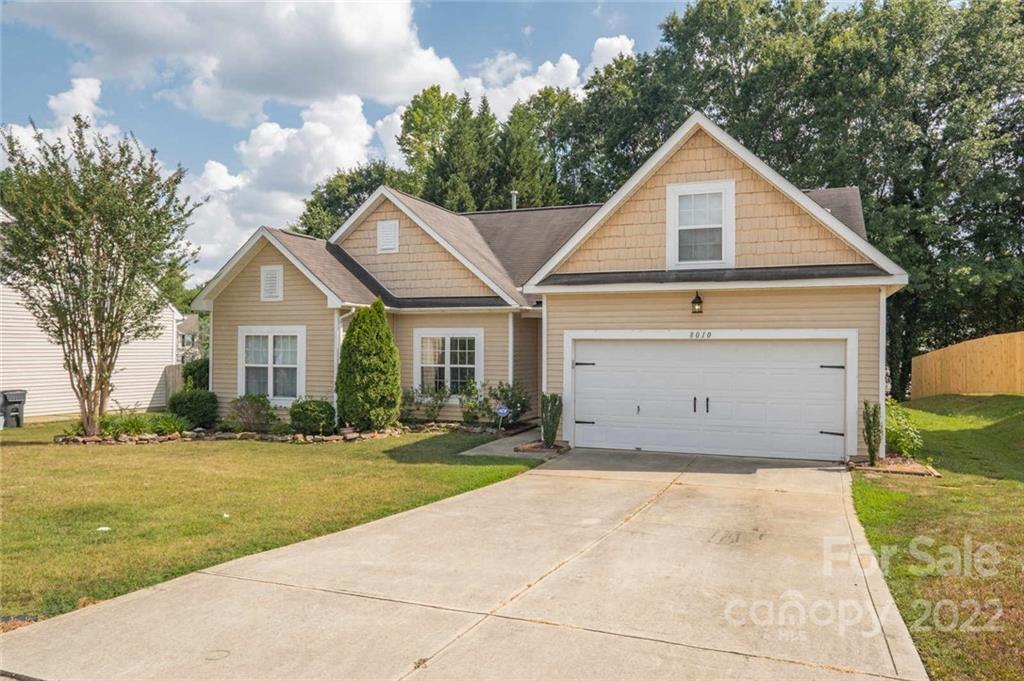 8010 Trotter Road Charlotte, NC 28216 - Photo 3 of 42 a view of a house with a yard