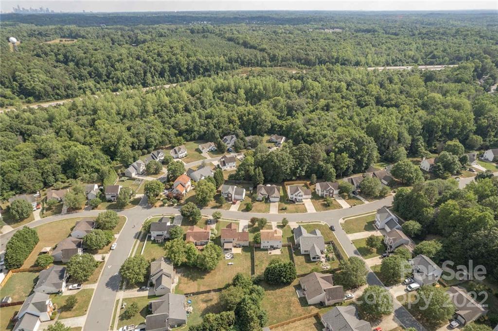 8010 Trotter Road Charlotte, NC 28216 - Photo 36 of 42 an aerial view of a houses with a yard
