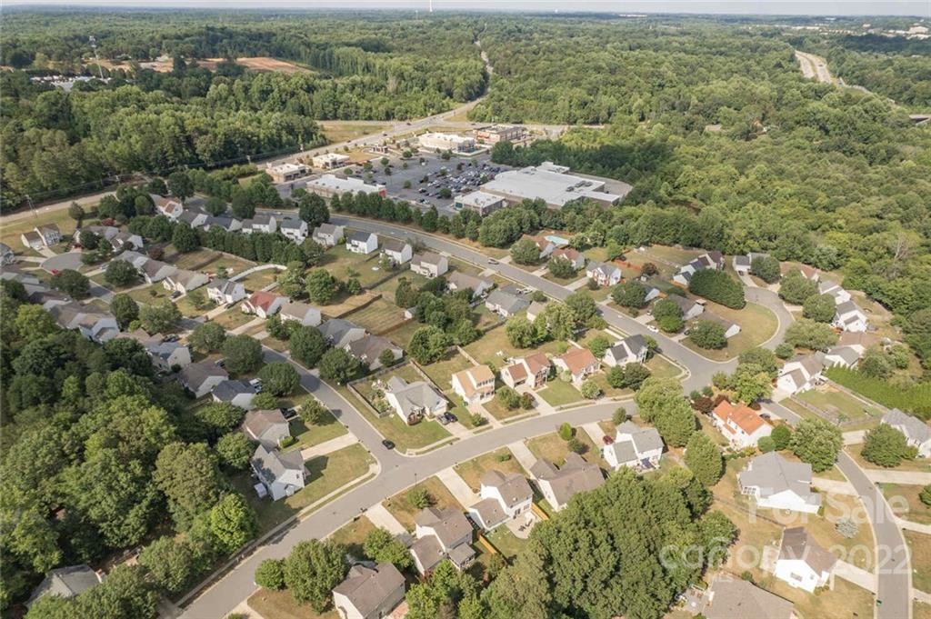 8010 Trotter Road Charlotte, NC 28216 - Photo 41 of 42 an aerial view of residential houses with outdoor space