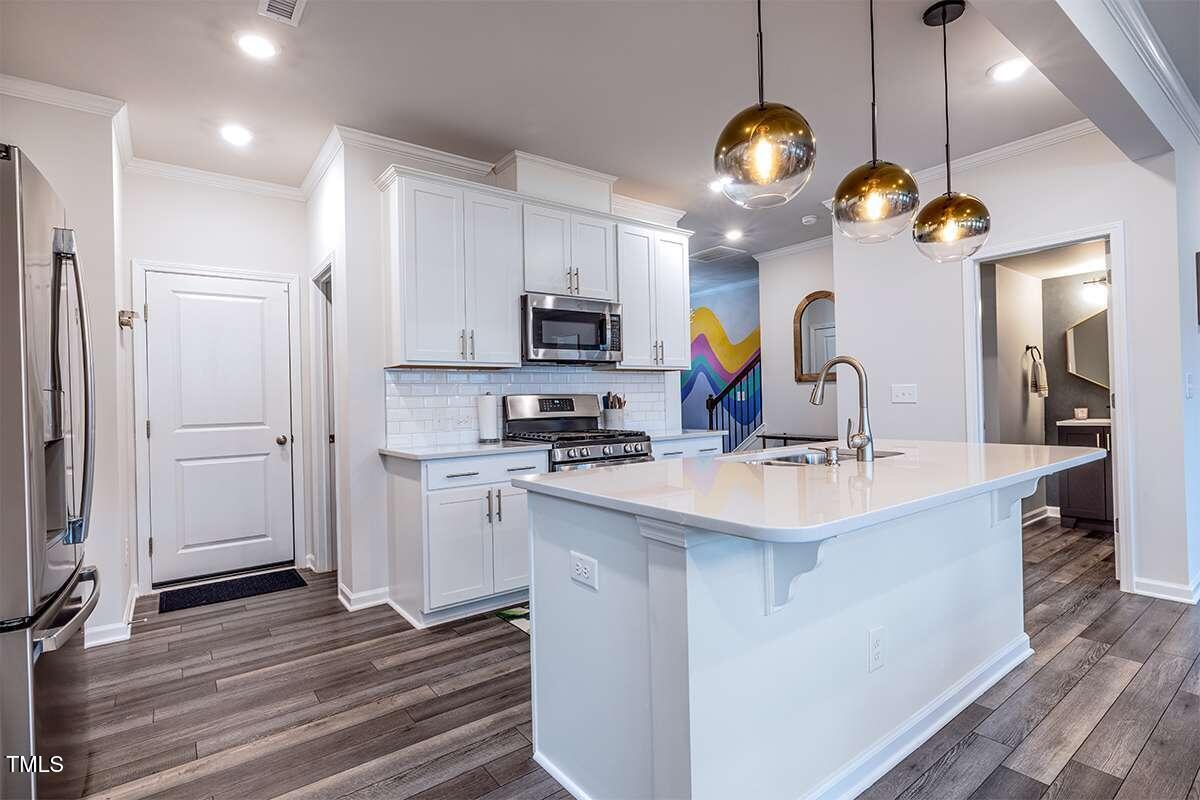 113 Velten Ridge Drive Durham, NC 27713 - Photo 5 of 39 Quadros.5