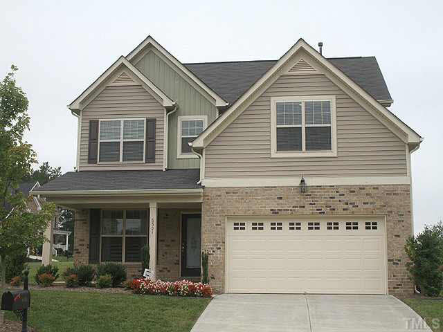 6501 Ridgemount Street Wake Forest, NC 27587 - Photo 2 of 25 Your new home sets on a large corner lot with great landscaping plus raised gardening beds!