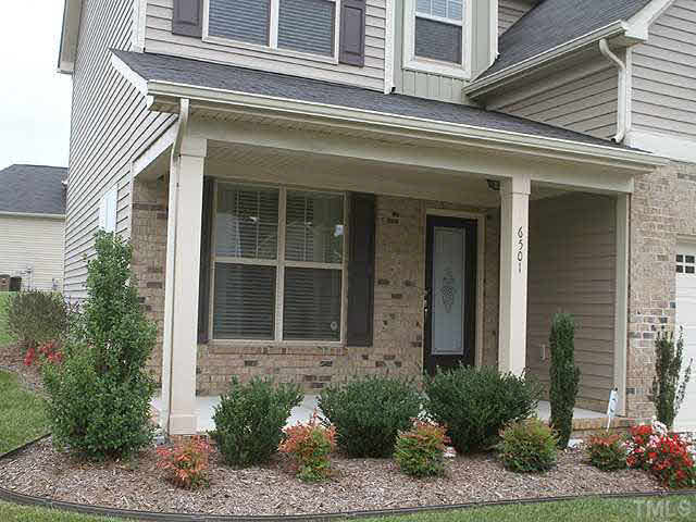 6501 Ridgemount Street Wake Forest, NC 27587 - Photo 3 of 25 Your front porch is just waiting for you and your rocking chairs!
