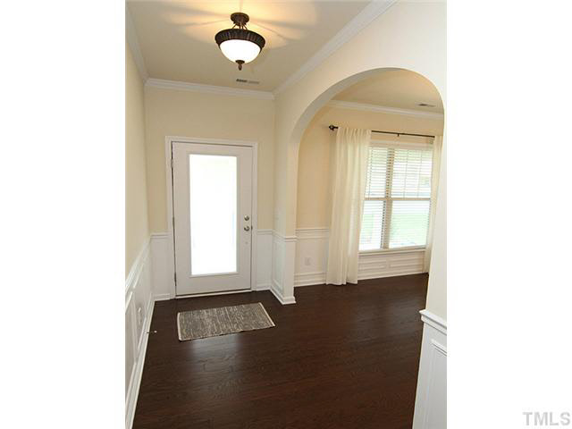 6501 Ridgemount Street Wake Forest, NC 27587 - Photo 4 of 25 Welcome Home! Beautiful wainscoting, crown moldings and hardwood floors welcomes you HOME!