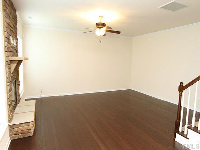 6501 Ridgemount Street Wake Forest, NC 27587 - Photo 8 of 25 Another view of your family room, complete with a ceiling fan!