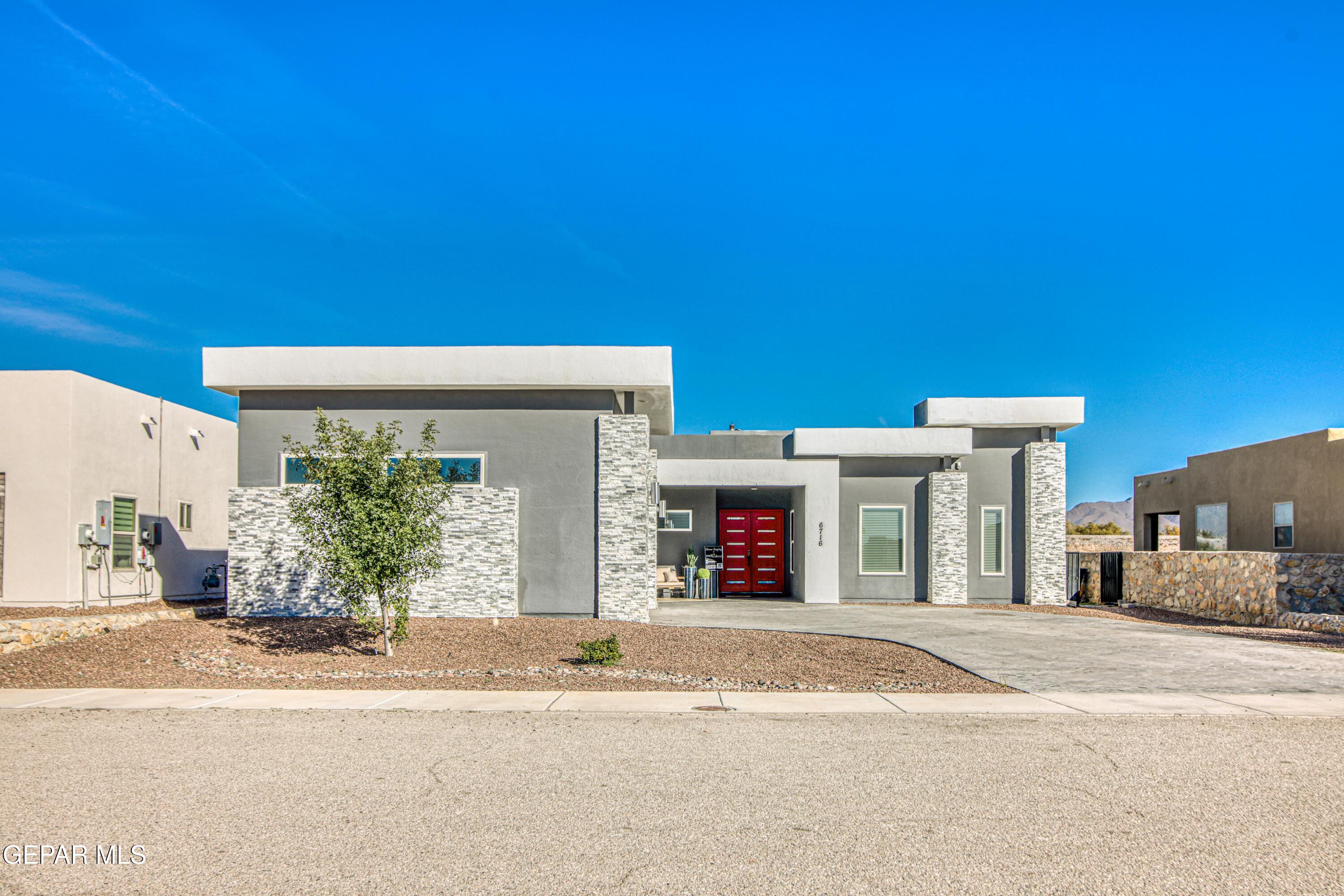 a view of a house with a entertaining space