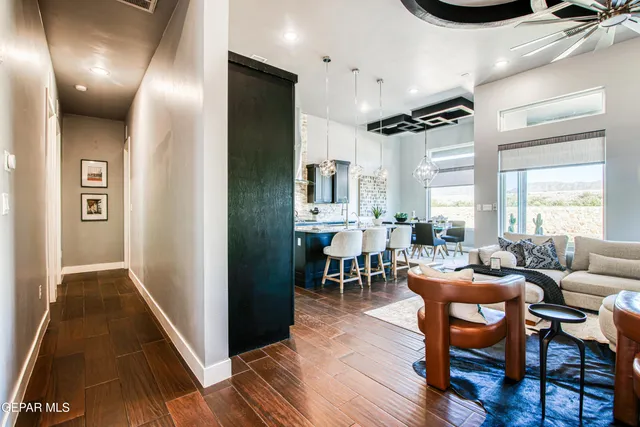 a living room with furniture and a rug