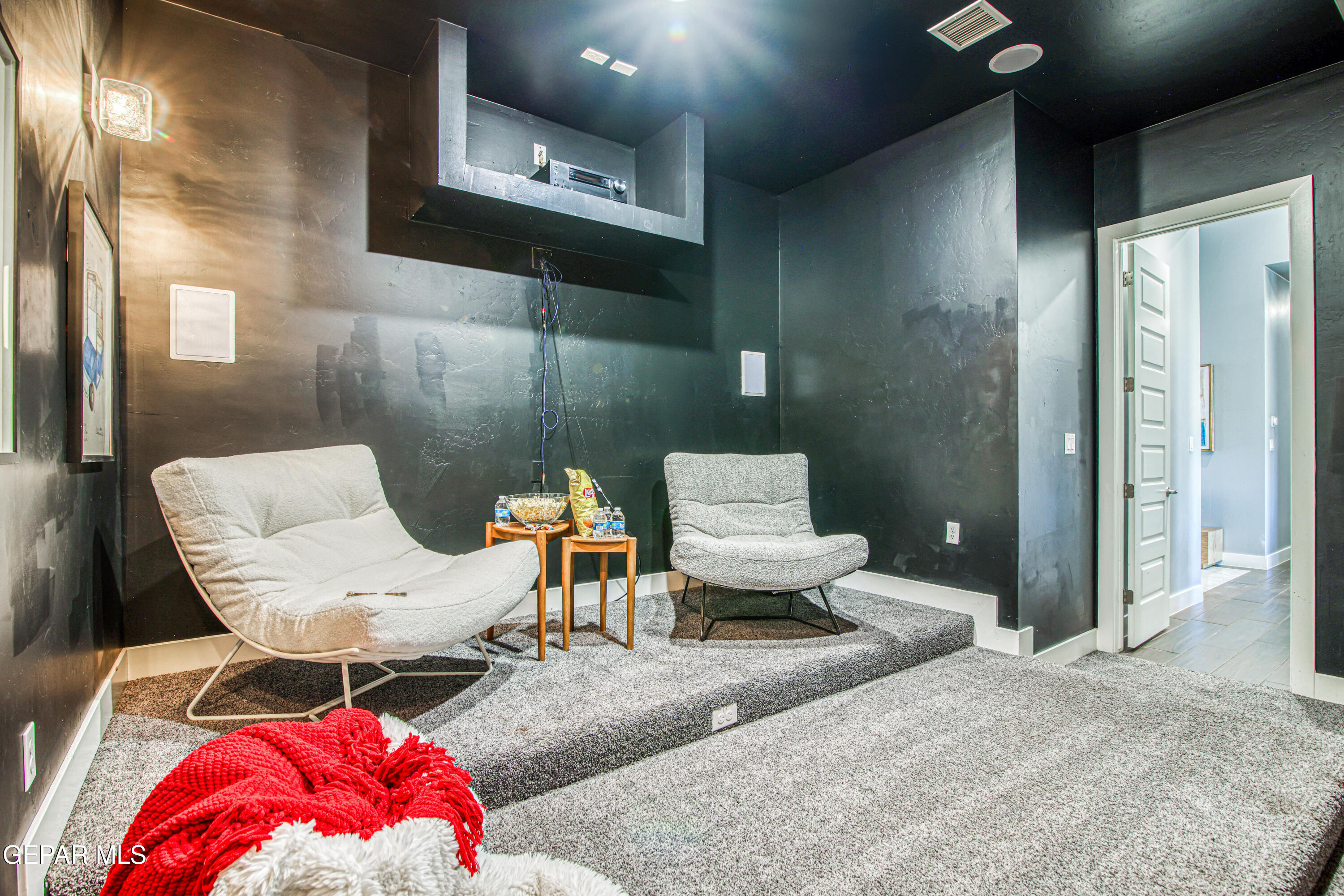 6716 Rio Haciendas El Paso, TX 79932 - Photo 25 of 65 a living room with furniture and a rug