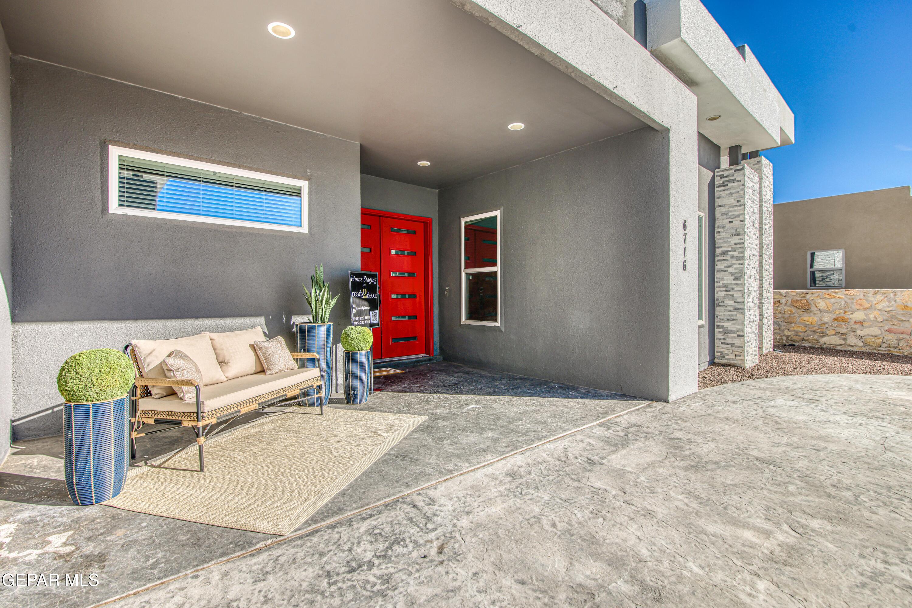 6716 Rio Haciendas El Paso, TX 79932 - Photo 4 of 65 a view of a livingroom with furniture and a couch