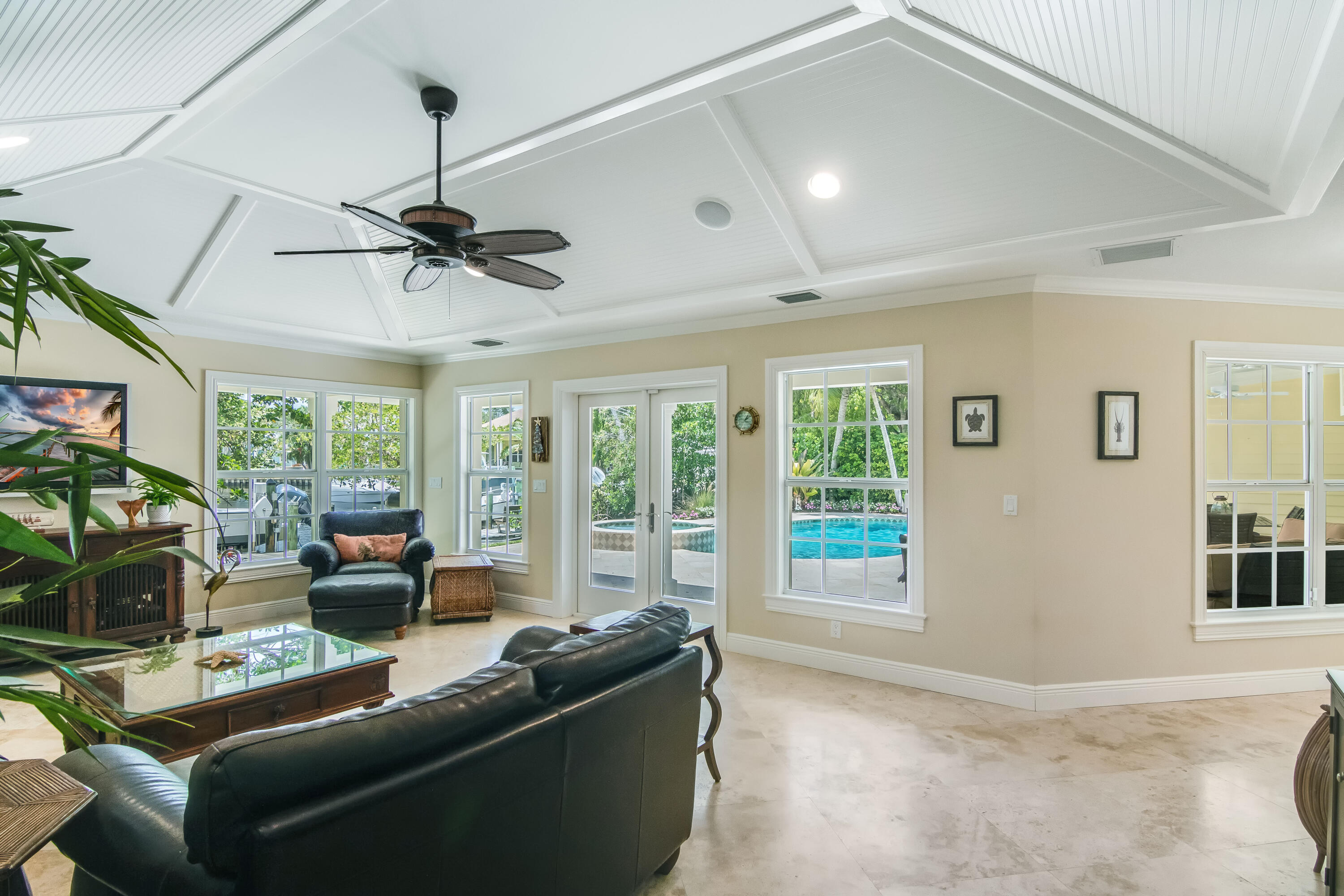 936 Dolphin Drive Jupiter, FL 33458 - Photo 24 of 72 a living room with furniture and a large window