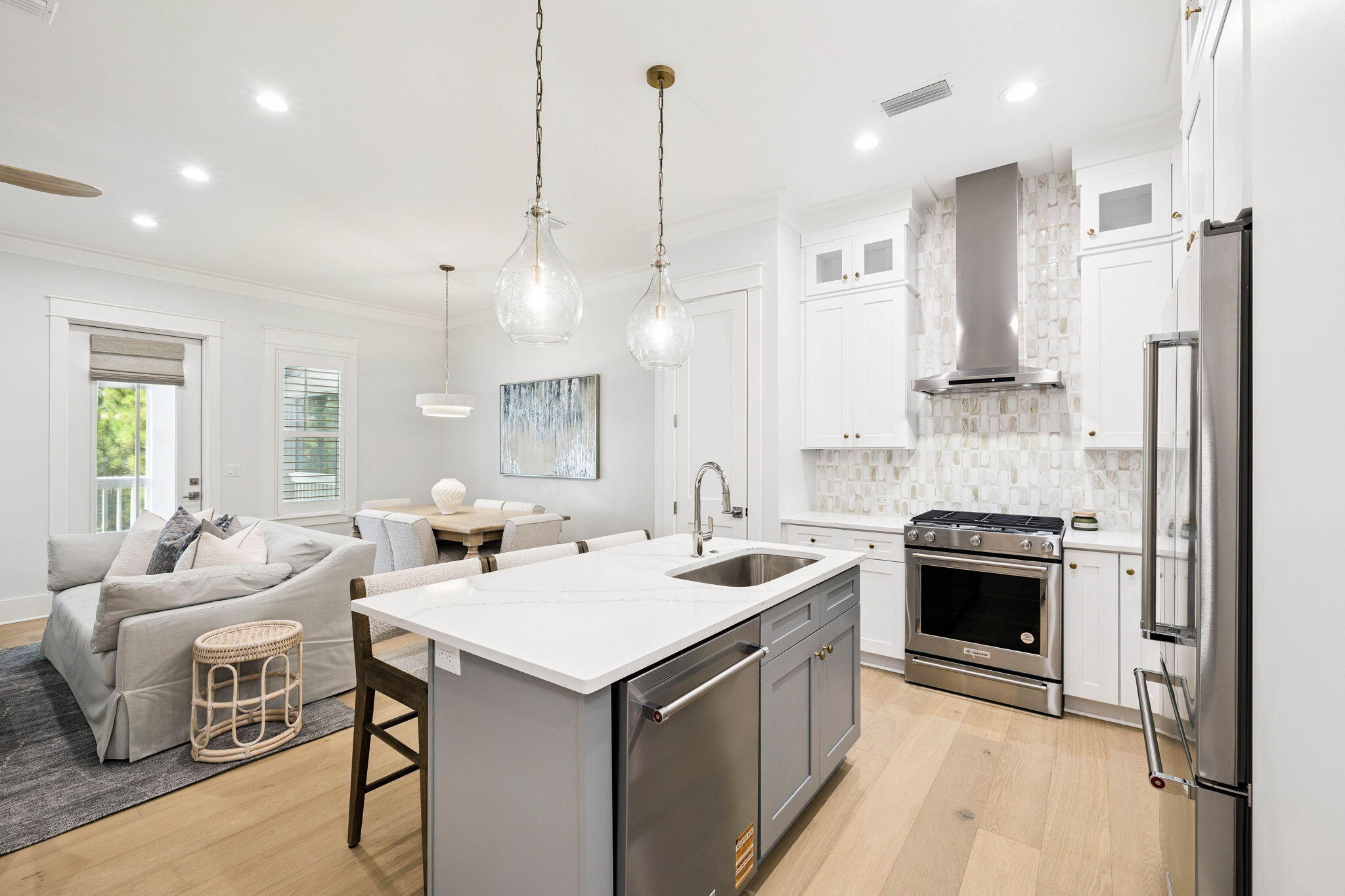 45 Grove Townhomes Place, Unit 105 Santa Rosa Beach, FL 32459 - Photo 14 of 36 a kitchen with a sink stove and refrigerator