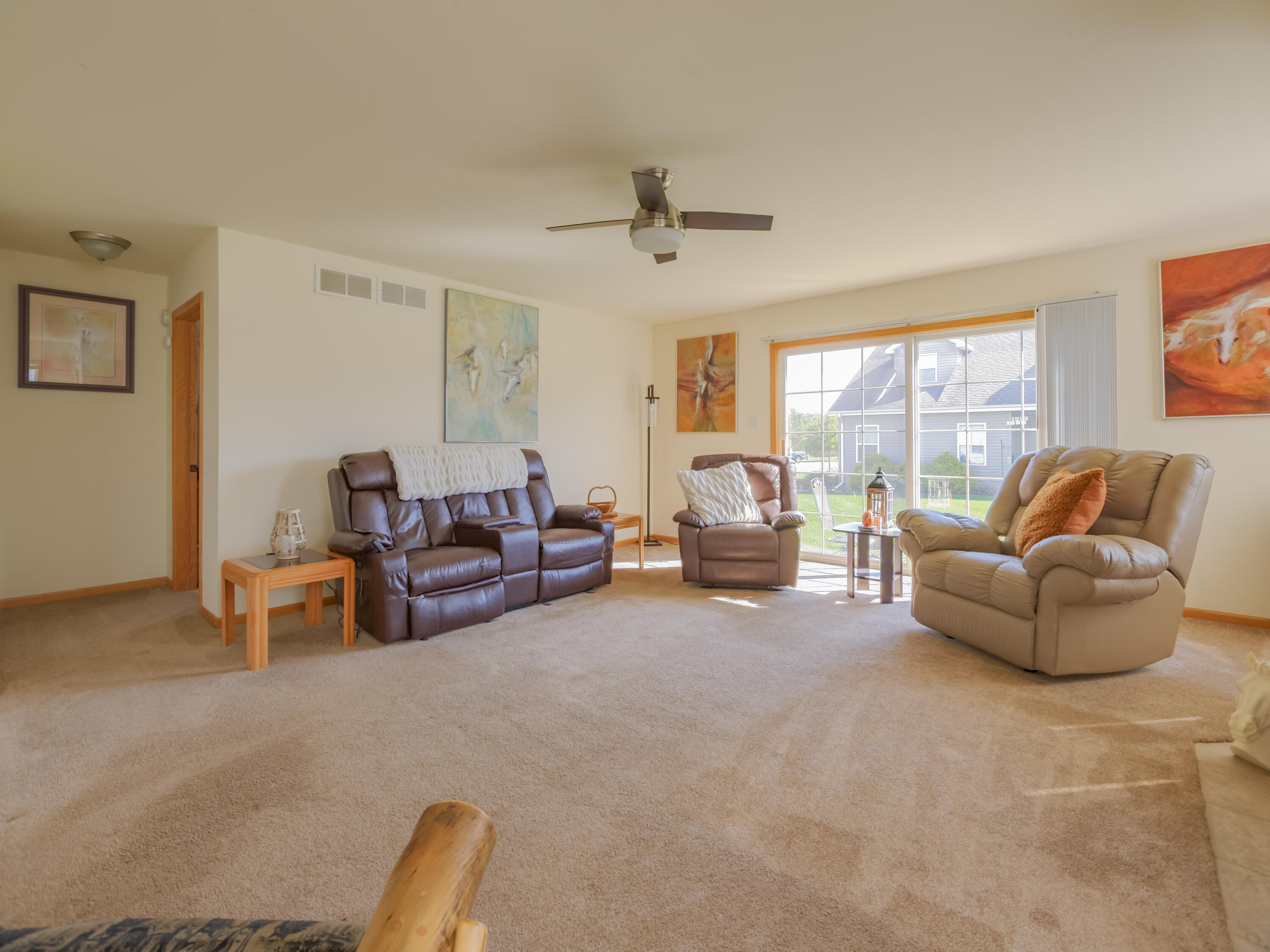 10123 Azalea Drive Crown Point, IN 46307 - Photo 19 of 32 a living room with furniture and a large window