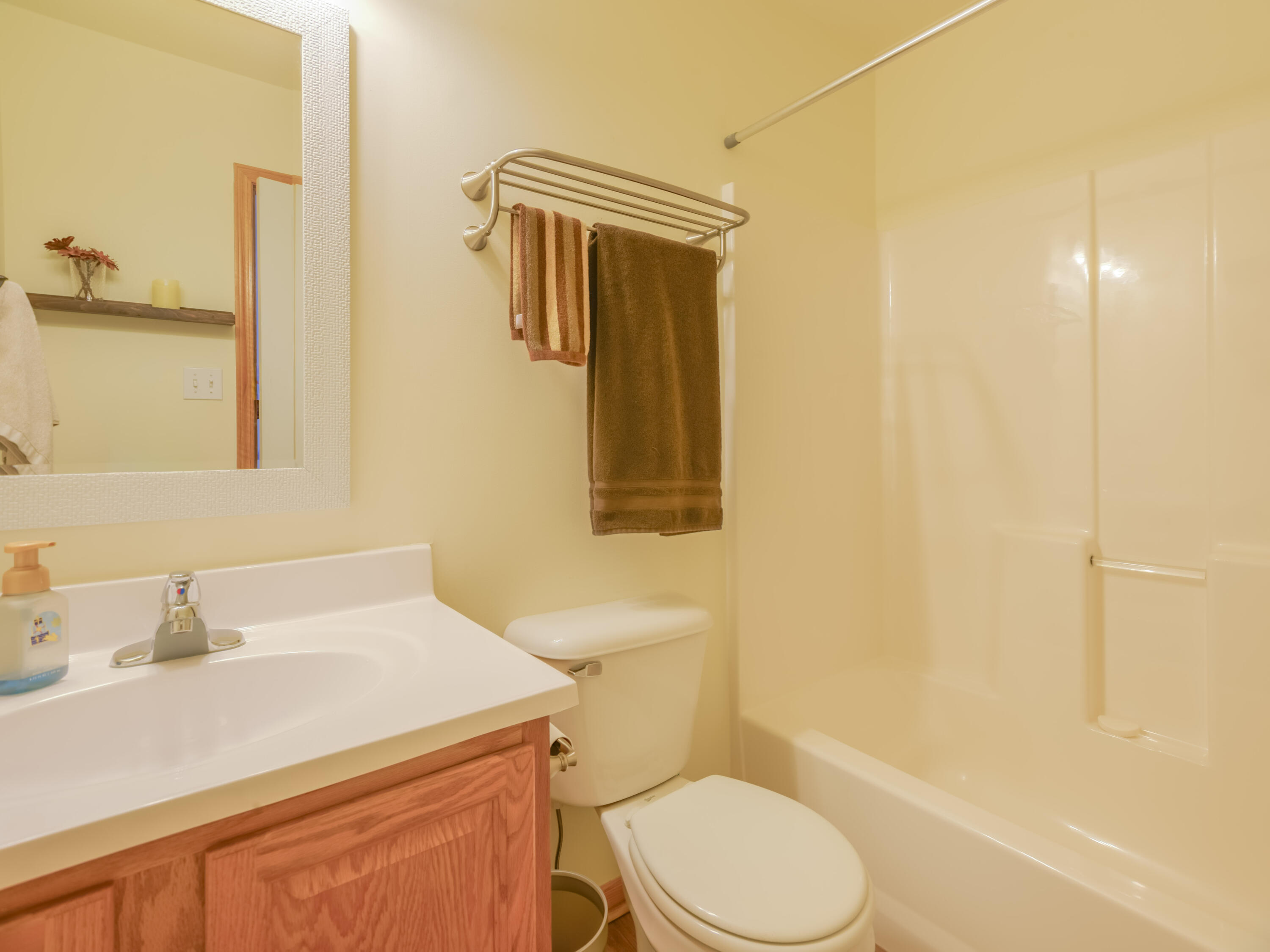 10123 Azalea Drive Crown Point, IN 46307 - Photo 30 of 32 a bathroom with a sink a toilet and shower