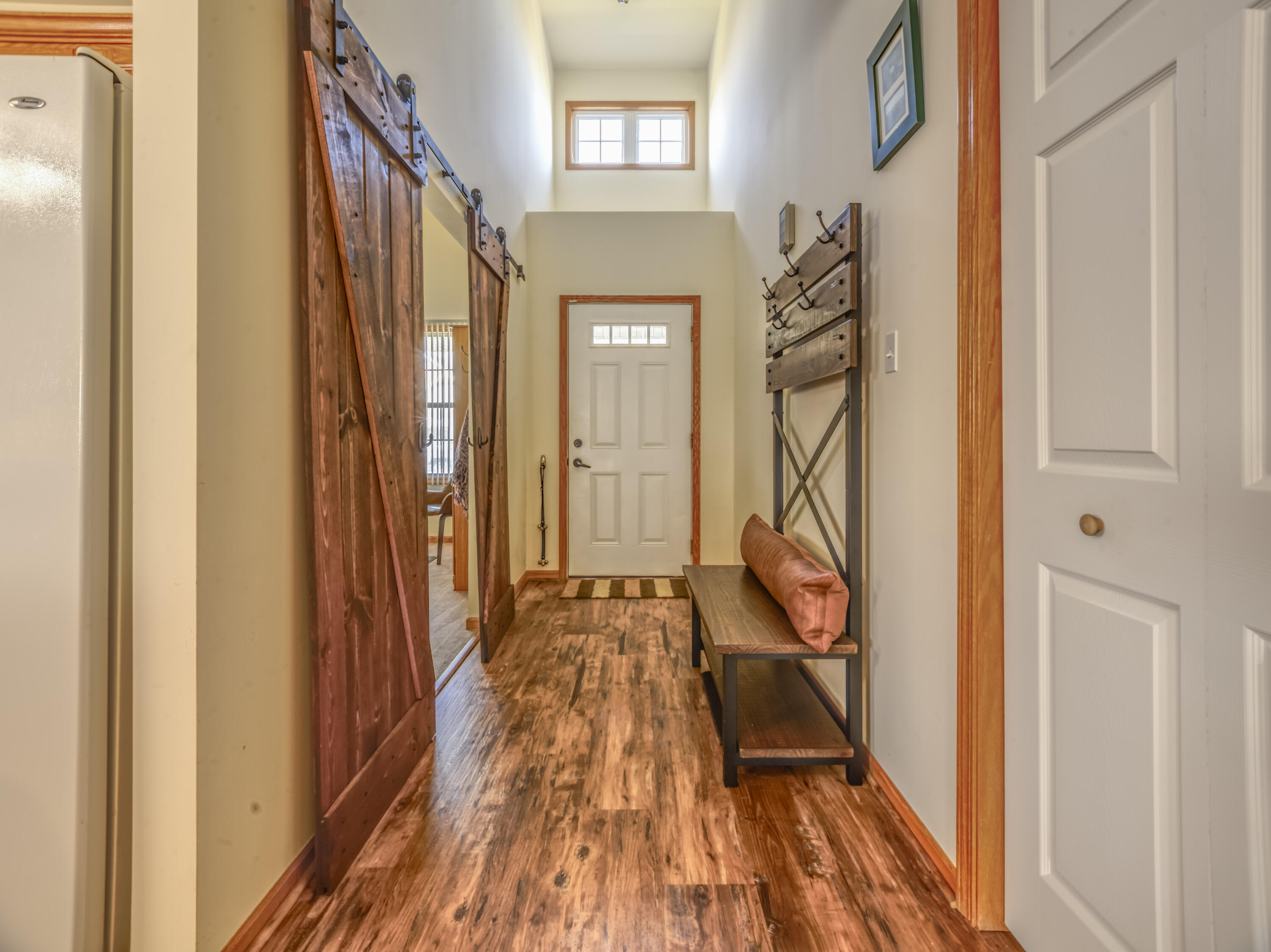 10123 Azalea Drive Crown Point, IN 46307 - Photo 5 of 32 a view of a entryway door with wooden floor