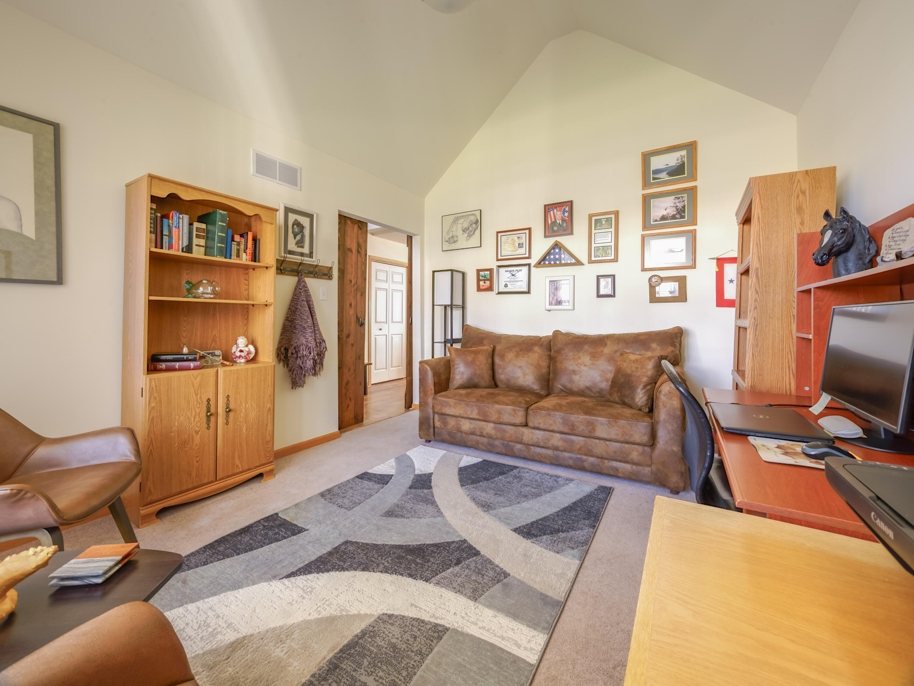 10123 Azalea Drive Crown Point, IN 46307 - Photo 7 of 32 a living room with furniture and a flat screen tv