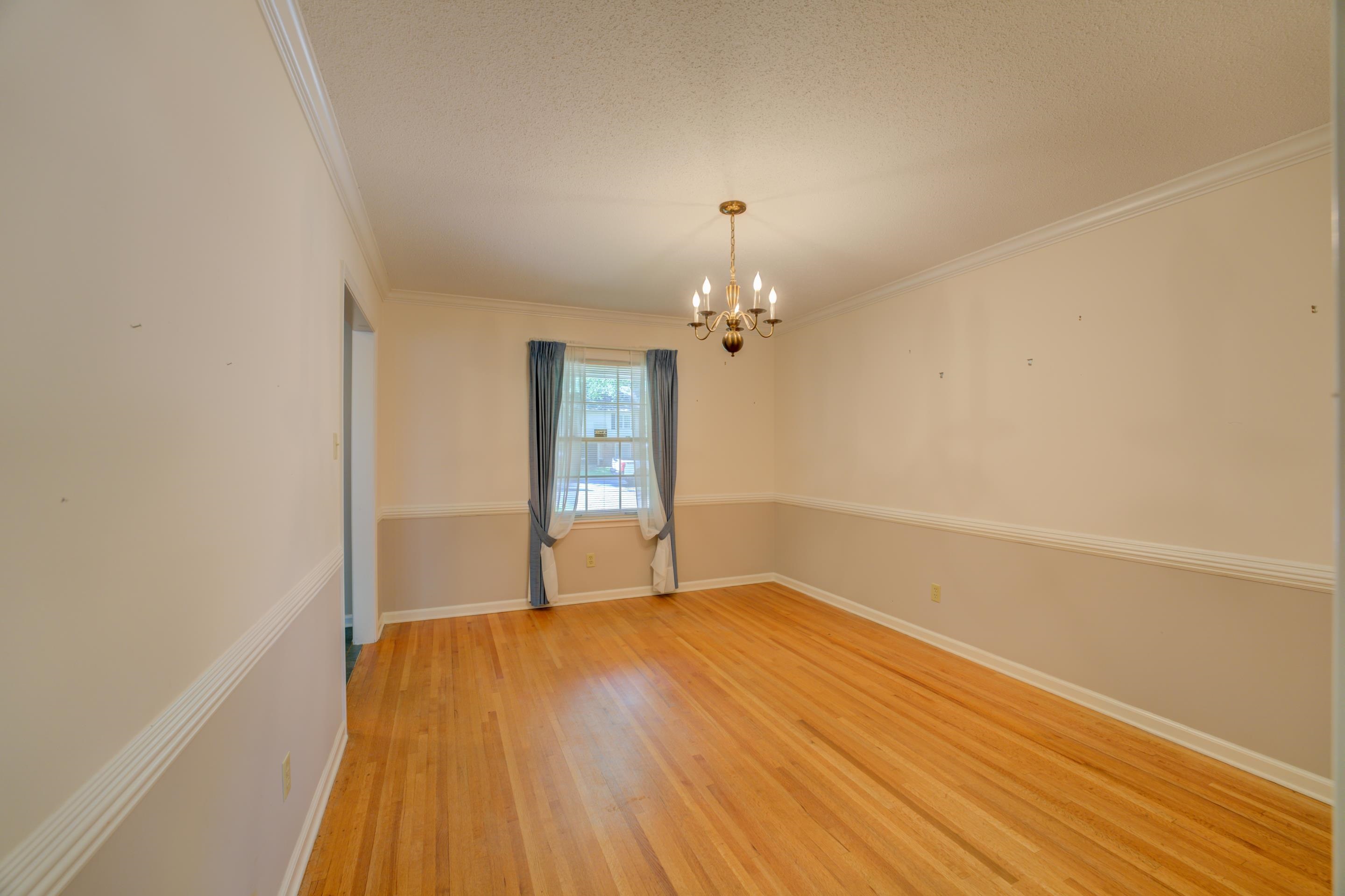 5868 Ridgevale Road Memphis, TN 38119 - Photo 3 of 24 a view of empty room with wooden floor