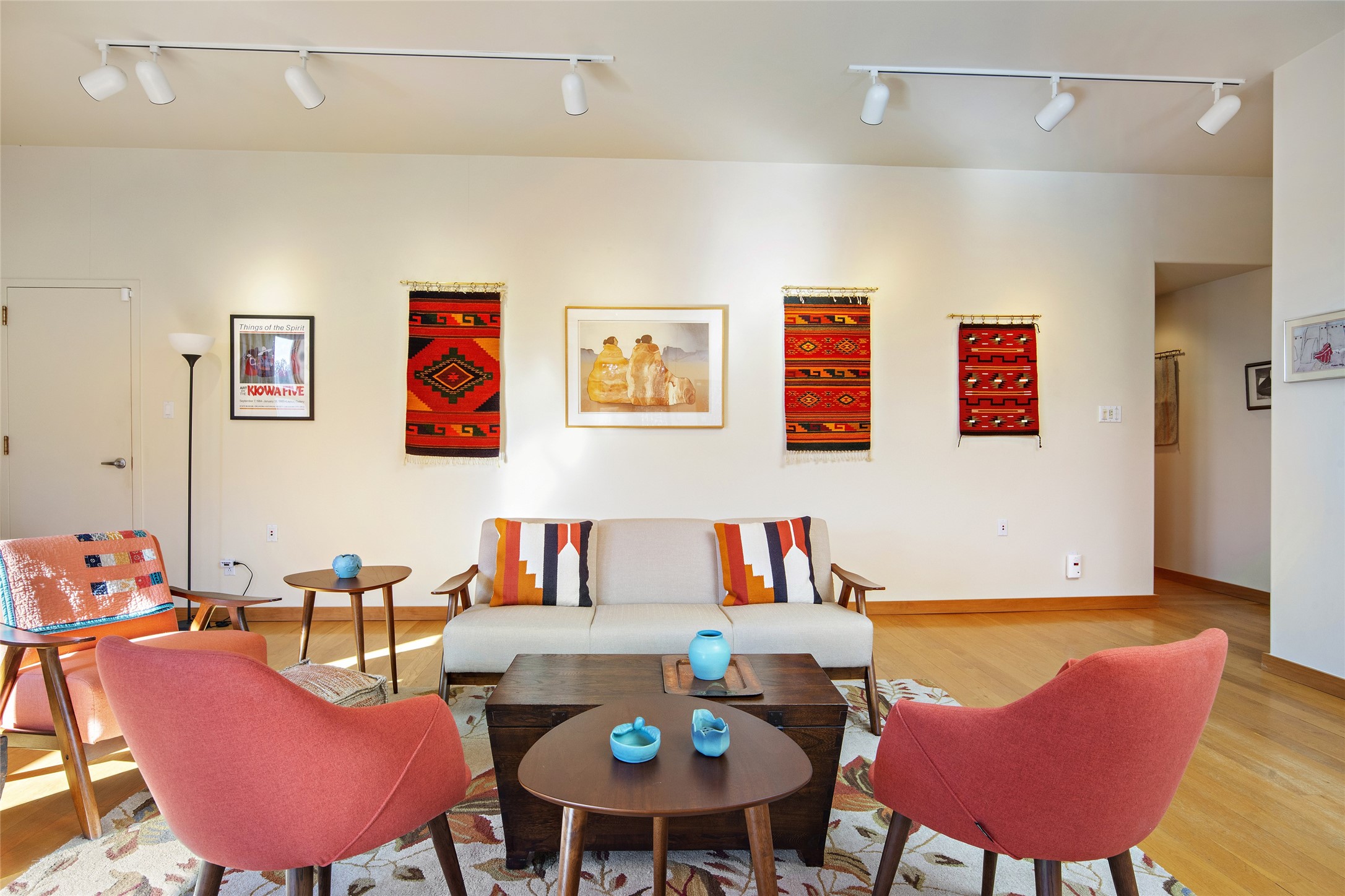 Open living room with lots of wall space for Art