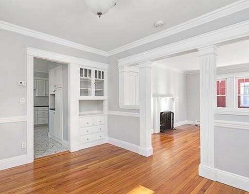 27 Elsworth Road Newton, MA 02465 - Photo 4 of 14 wooden floor in an empty room with a window