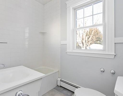 27 Elsworth Road Newton, MA 02465 - Photo 10 of 14 a bathroom with a sink and a toilet