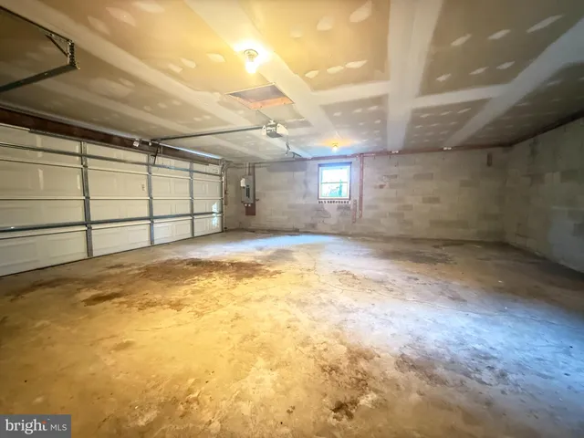 a utility room with a sink washer and dryer