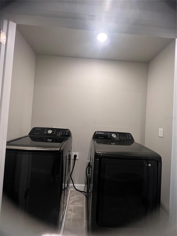 582 Amadoras Way St. Cloud, FL 34771 - Photo 19 of 22 a room with storage and utility