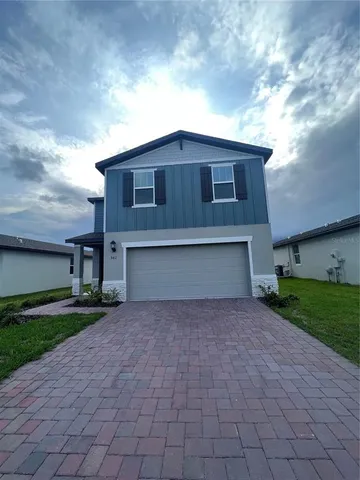 a house view with a garden space