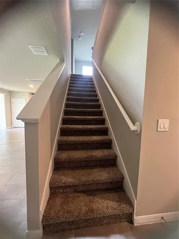 a view of a kitchen with a sink