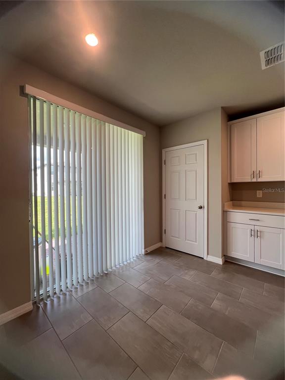 582 Amadoras Way St. Cloud, FL 34771 - Photo 6 of 22 a view of a kitchen with a sink