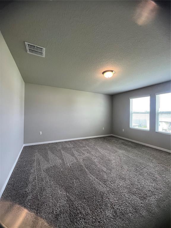 582 Amadoras Way St. Cloud, FL 34771 - Photo 10 of 22 an empty room with windows