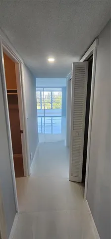 a view of a park with a tree