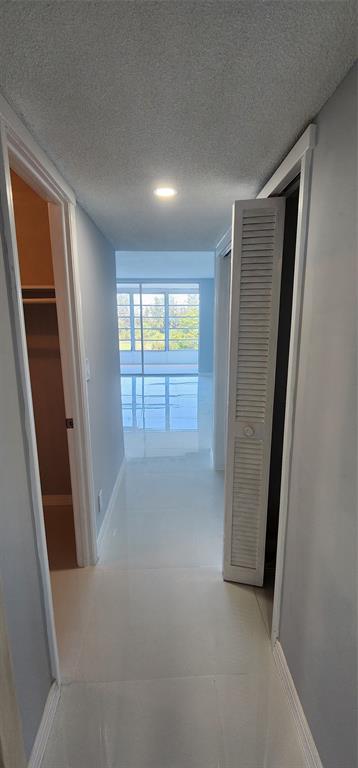 2650 South Course Drive, Unit 505 Pompano Beach, FL 33069 - Photo 28 of 42 an empty room with windows