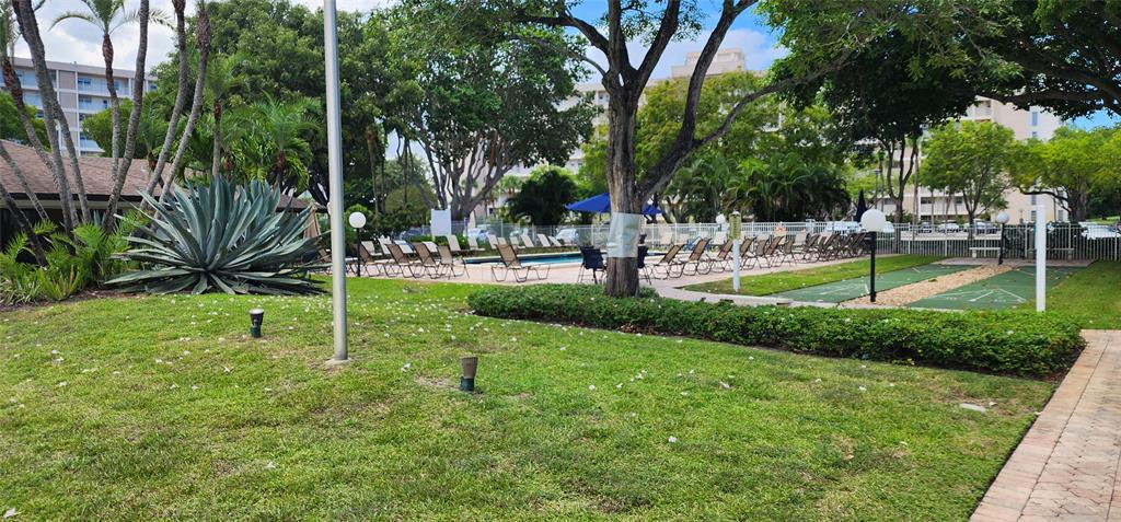 2650 South Course Drive, Unit 505 Pompano Beach, FL 33069 - Photo 34 of 42 a view of a park with a tree