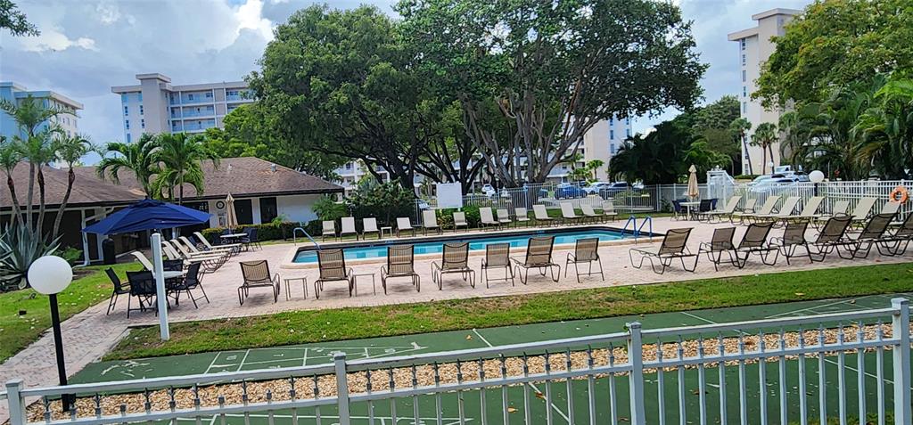 2650 South Course Drive, Unit 505 Pompano Beach, FL 33069 - Photo 36 of 42 a view of a house with a yard