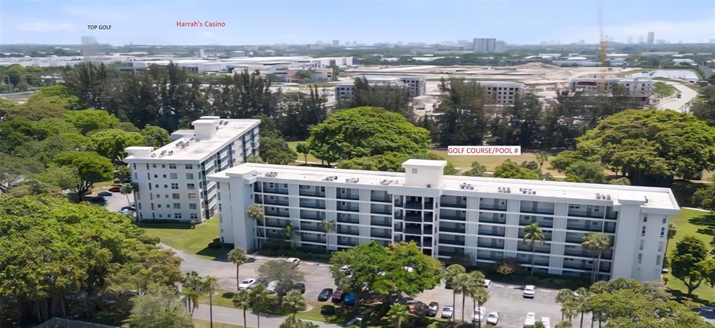 2650 South Course Drive, Unit 505 Pompano Beach, FL 33069 - Photo 40 of 42 a view of a balcony with outdoor space