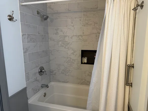 a bathroom with a bathtub