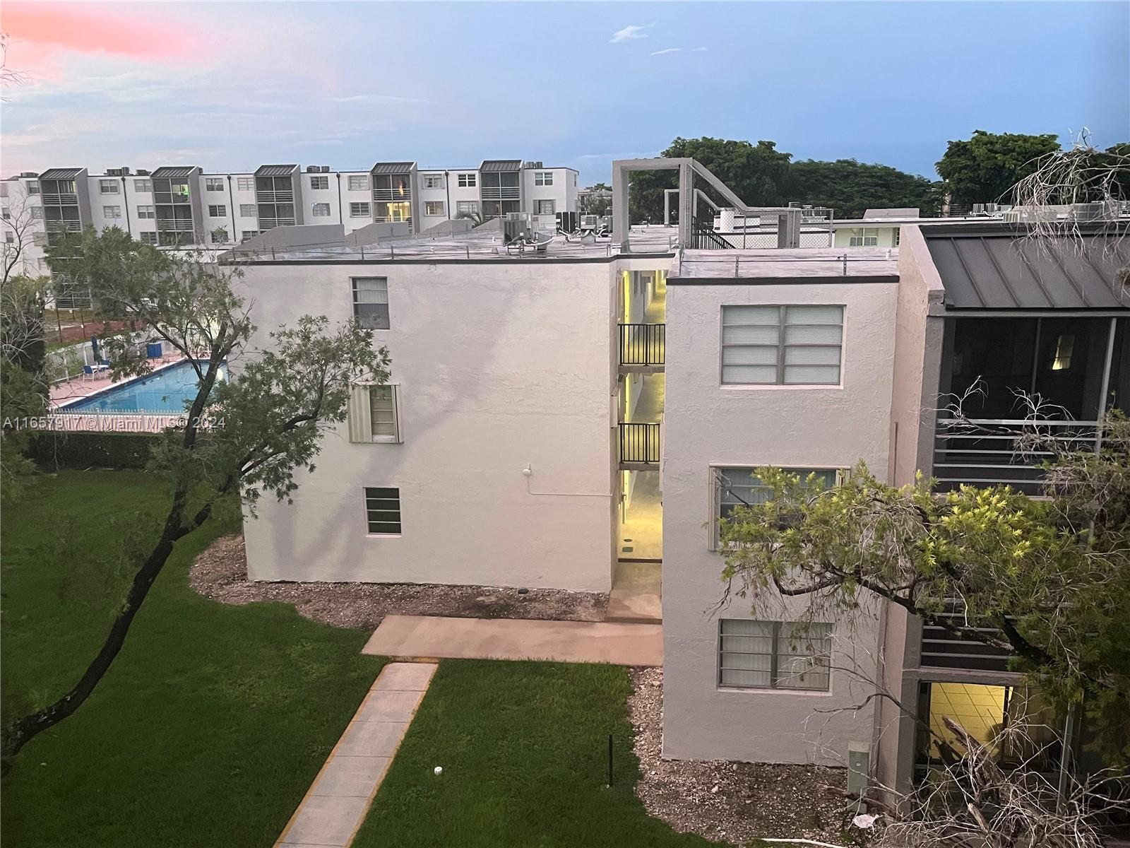 14165 Southwest 87th Street, Unit D404 Miami, FL 33183 - Photo 24 of 25 view from balcony