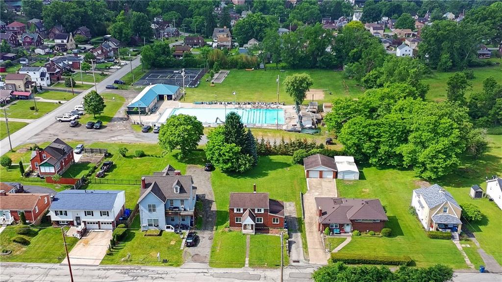 1420 Homestead Road Verona, PA 15147 - Photo 34 of 34 an aerial view of residential houses with outdoor space and swimming pool