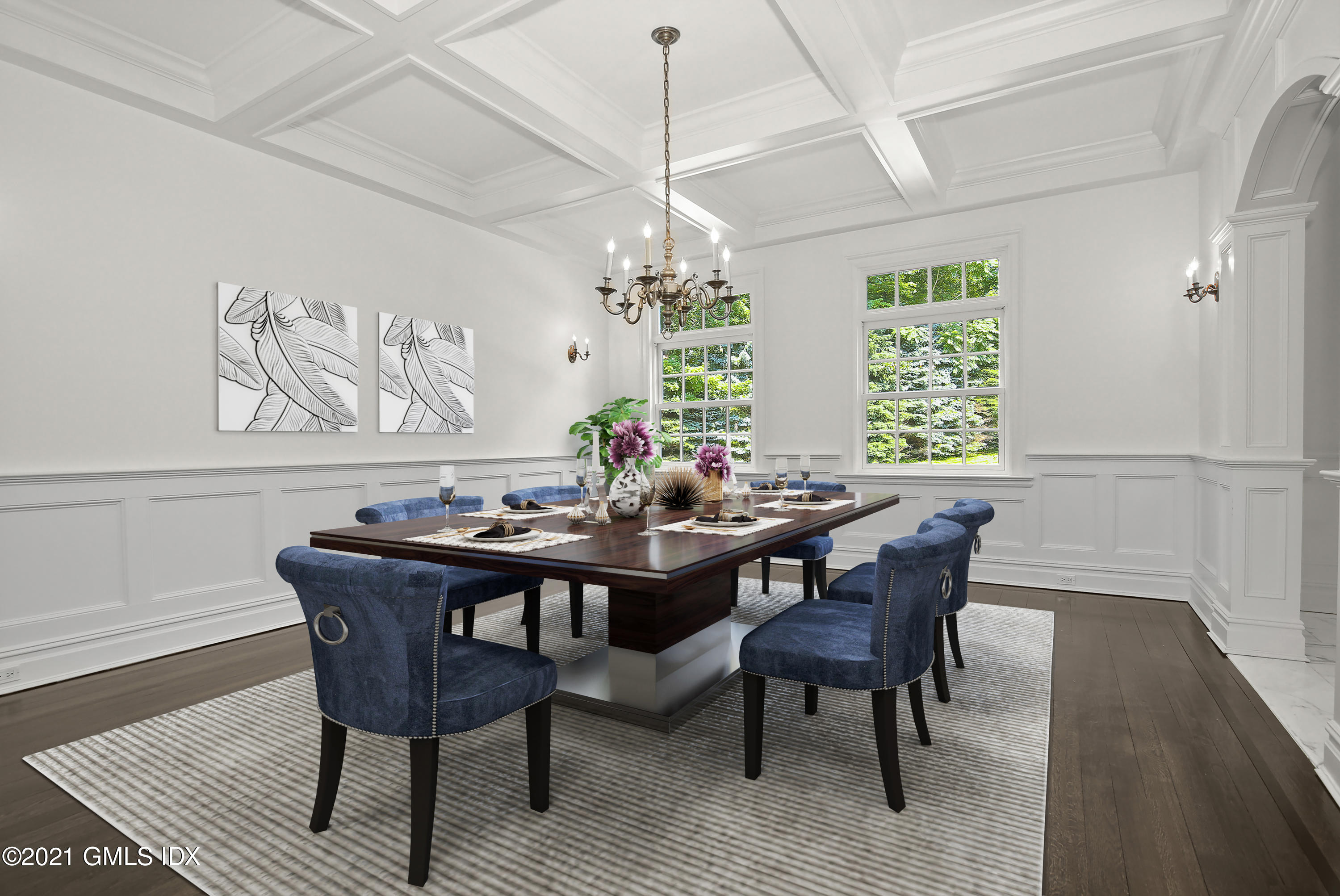 245 Bedford Road Greenwich, CT 06831 - Photo 13 of 27 a dining room with furniture a rug and a chandelier